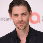 Profil Tom Payne